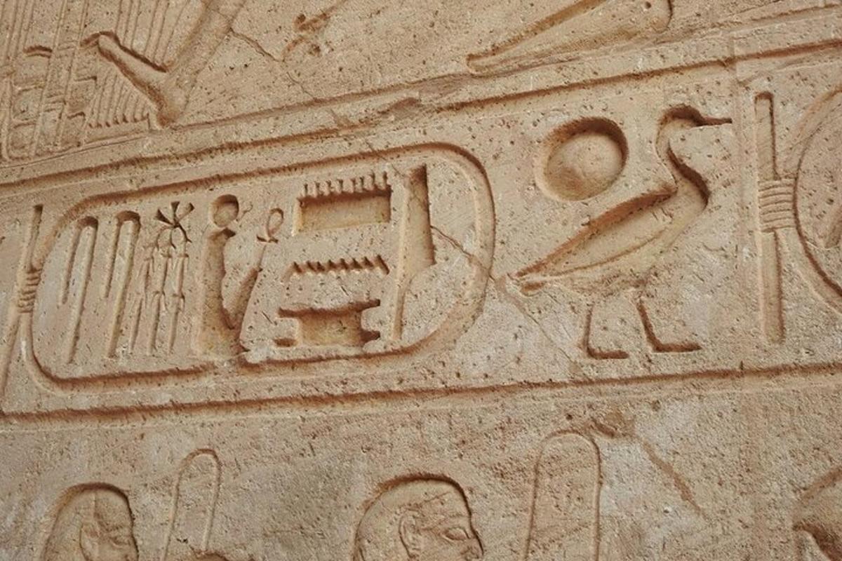 a sand sculpture of a machine on the side of a building