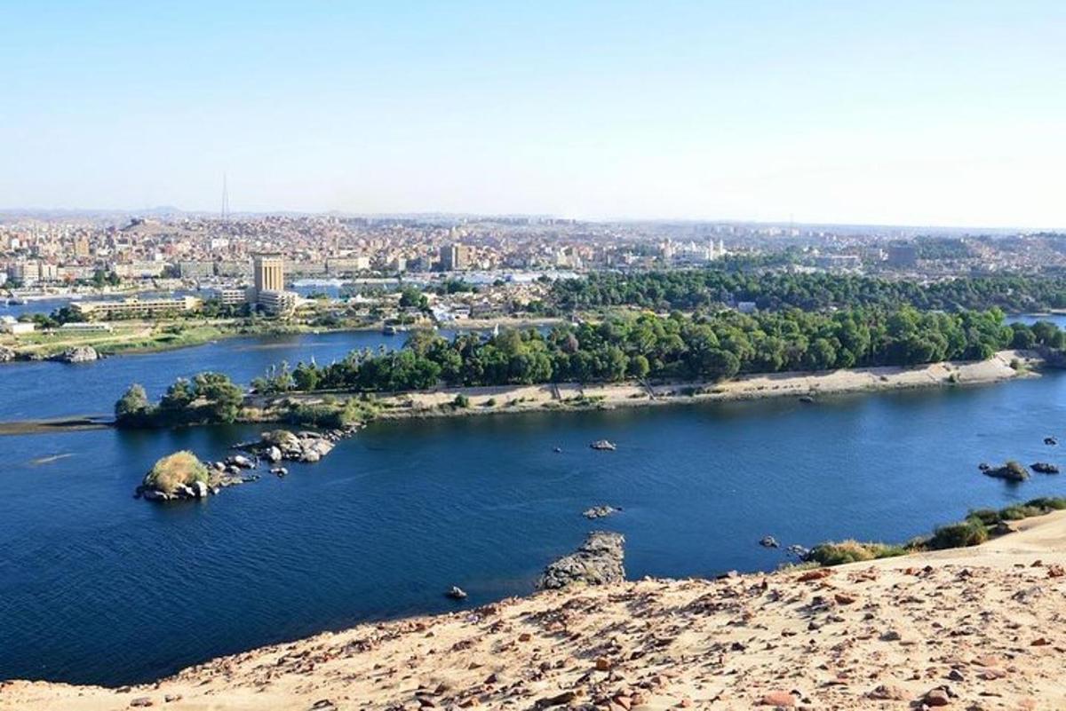 a view of a river with a city in the background