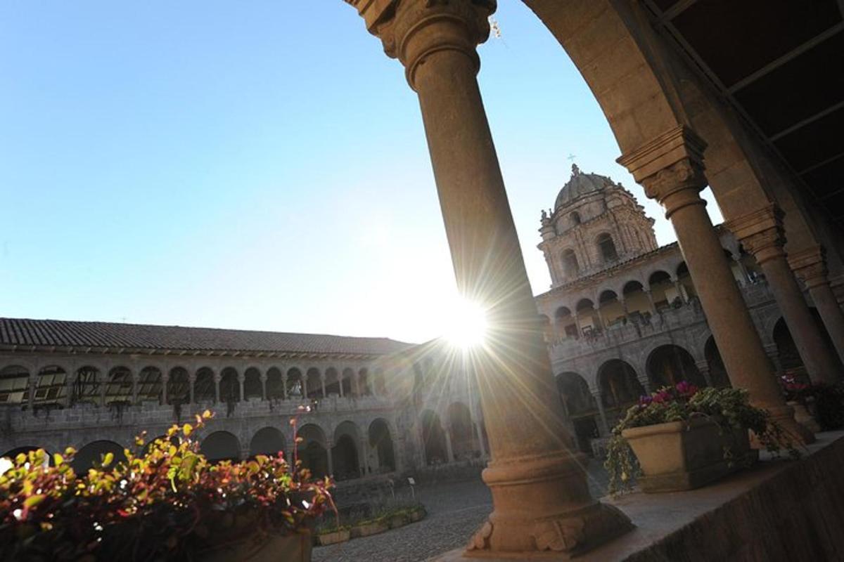 a view of a building with the sun shining through it