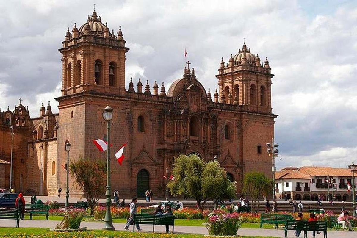 a large brick building with two towers on top of it