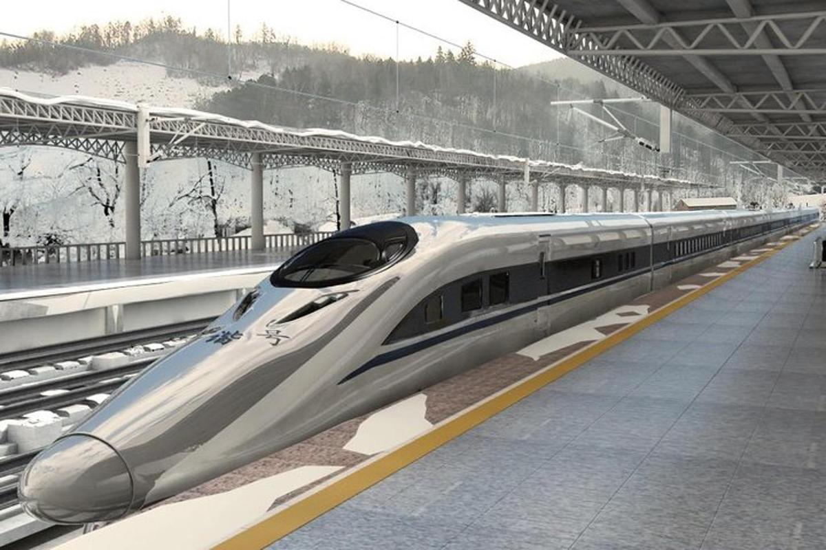 a bullet train is stopped at a train station
