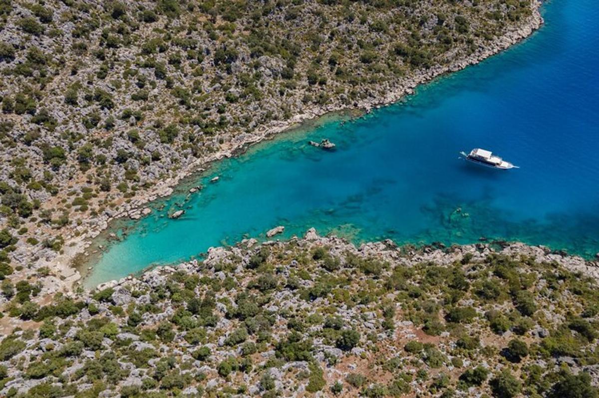 an island with a boat in the water