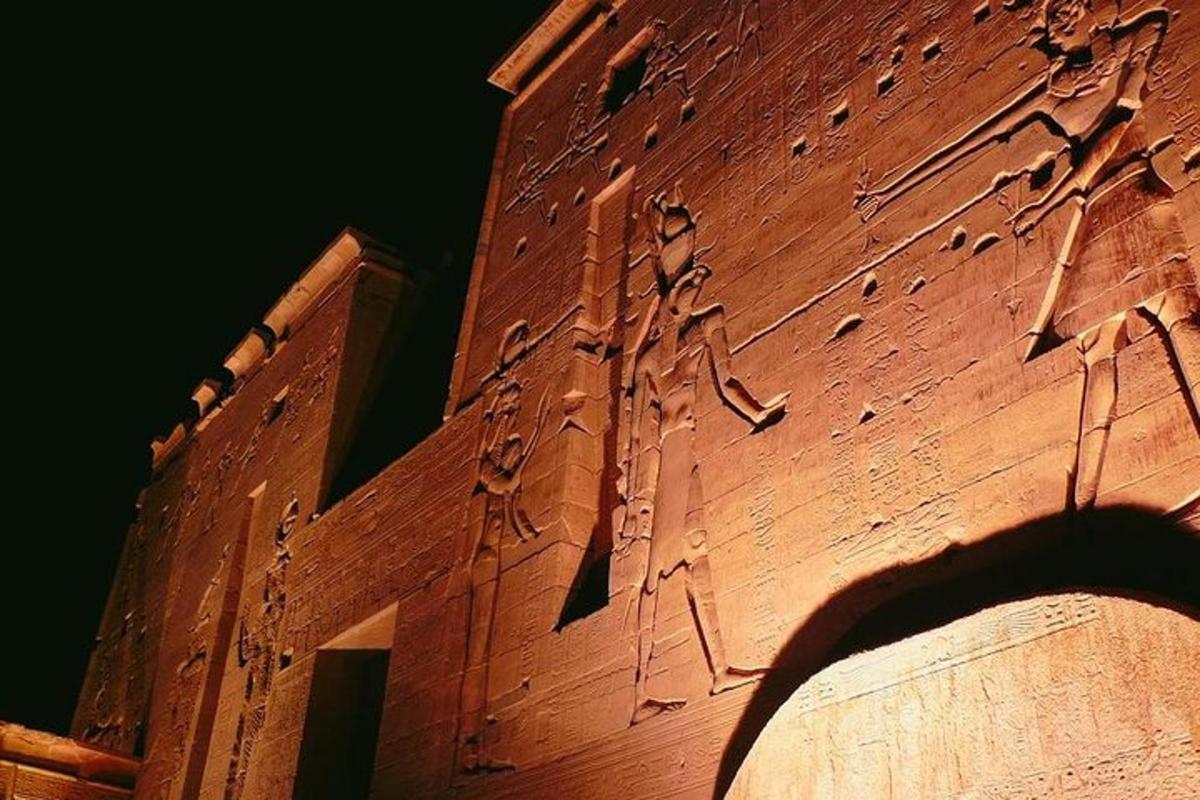 a brick building with writing on the side of it