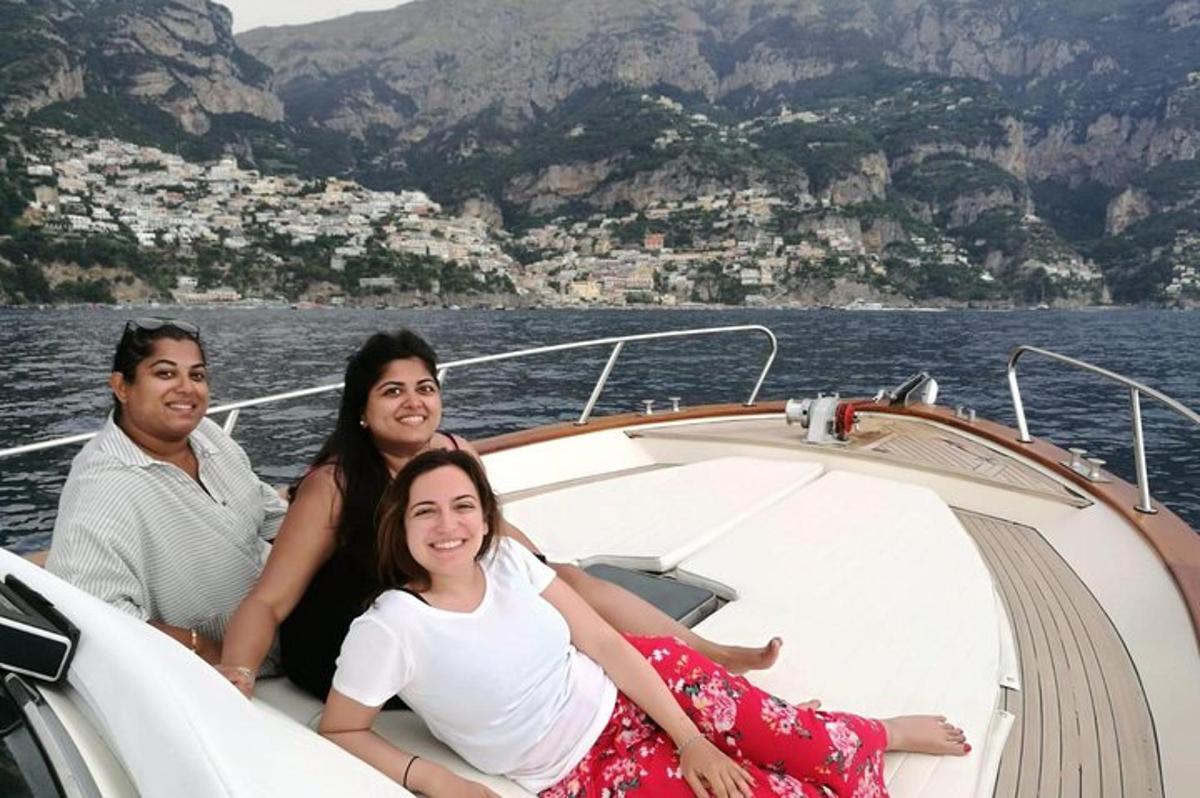 a group of people sitting on a boat
