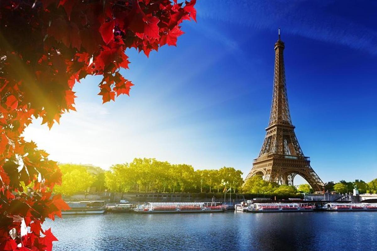 a view of the eiffel tower from across the river