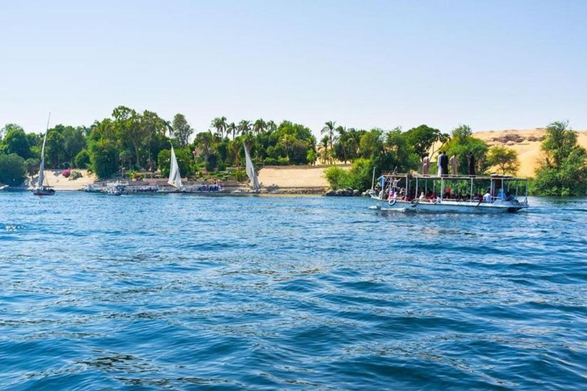 a boat filled with people on a large body of water