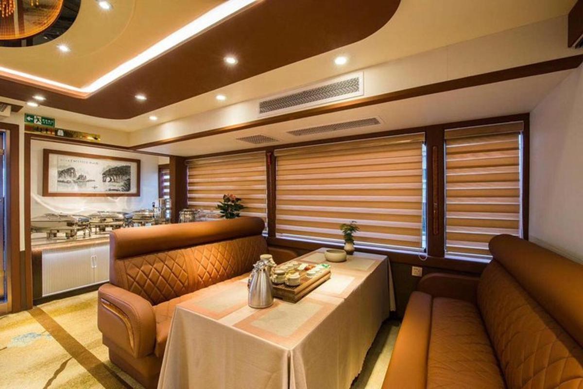 a dining room with a table and a couch