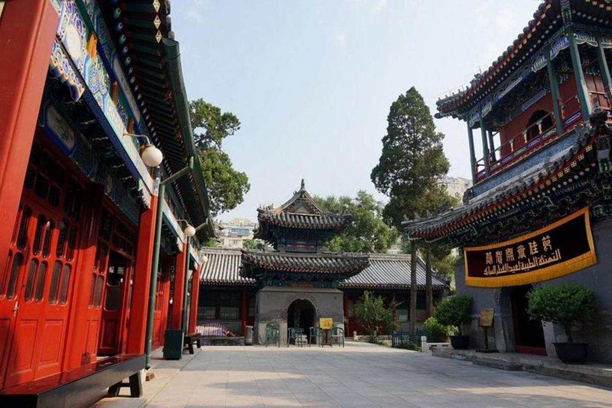 an asian building with a sign in front of it
