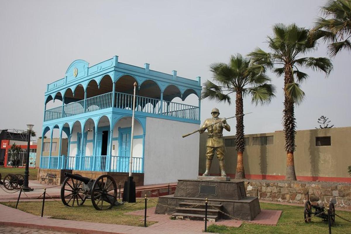 a statue of a man standing in front of a building