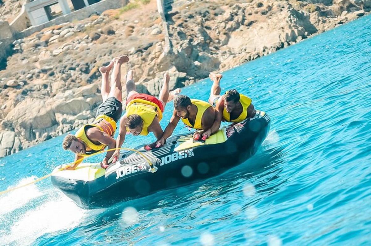 a group of people on a raft in the water