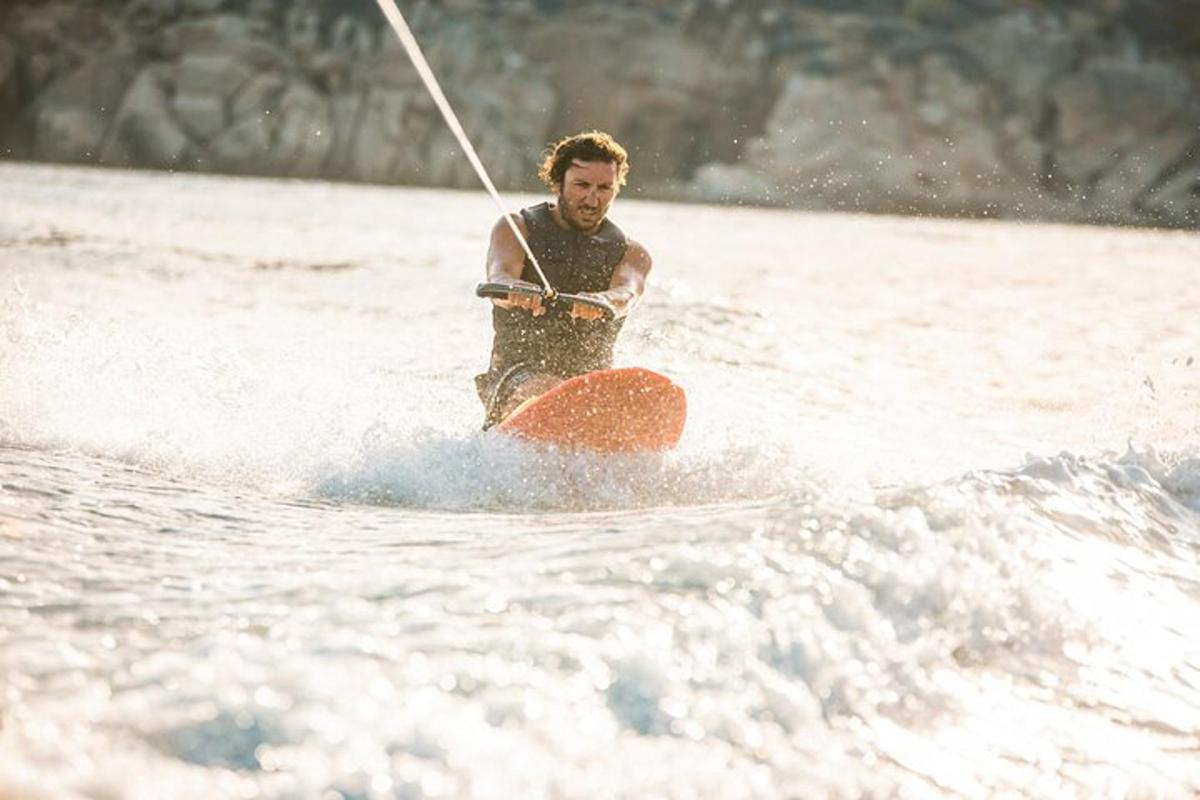 a man on a board in the water