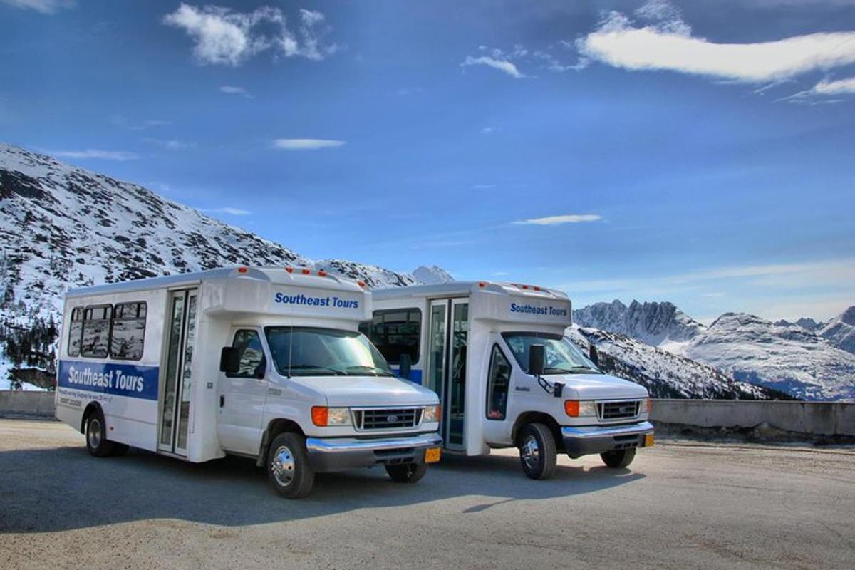 two ambulances are parked next to each other