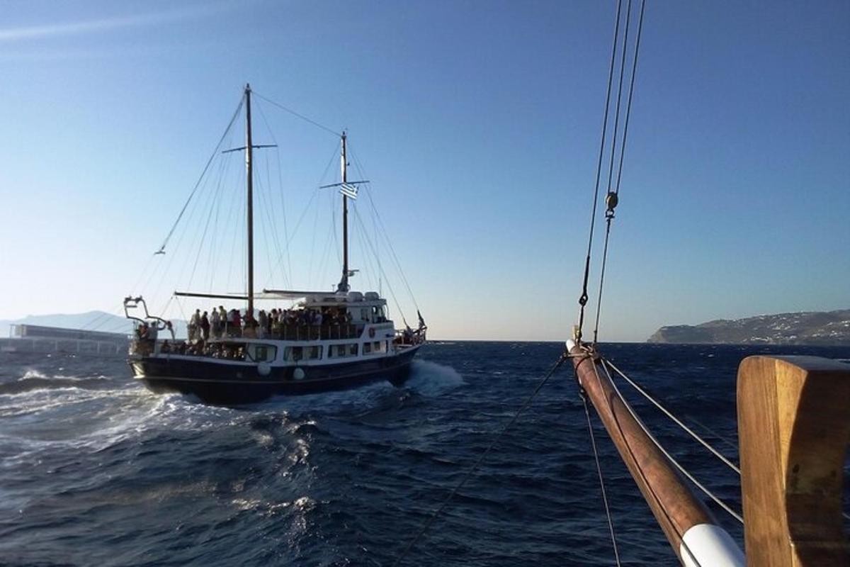 a boat with people on it in the water