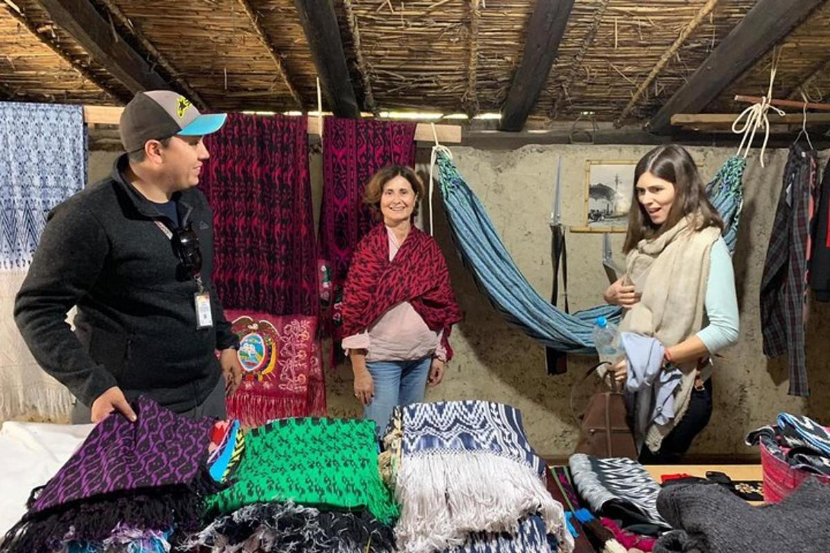 a man and two women are standing in a store with yarn