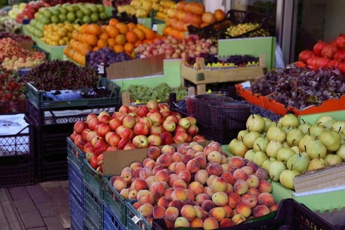 a display of fruits and vegetables in a market
