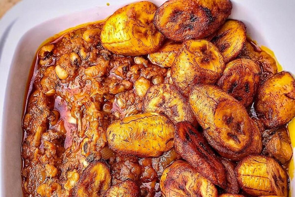 a casserole dish filled with meat and potatoes