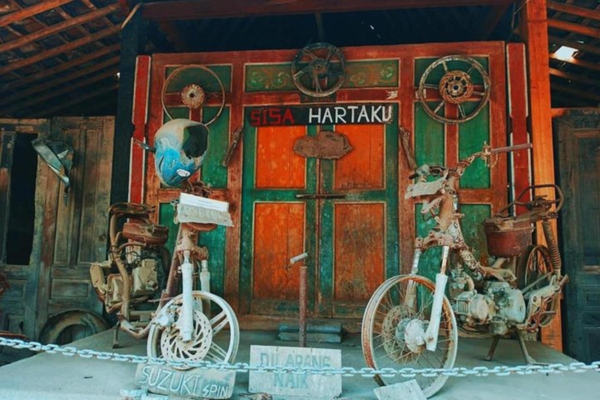 a couple of bikes parked in front of a building