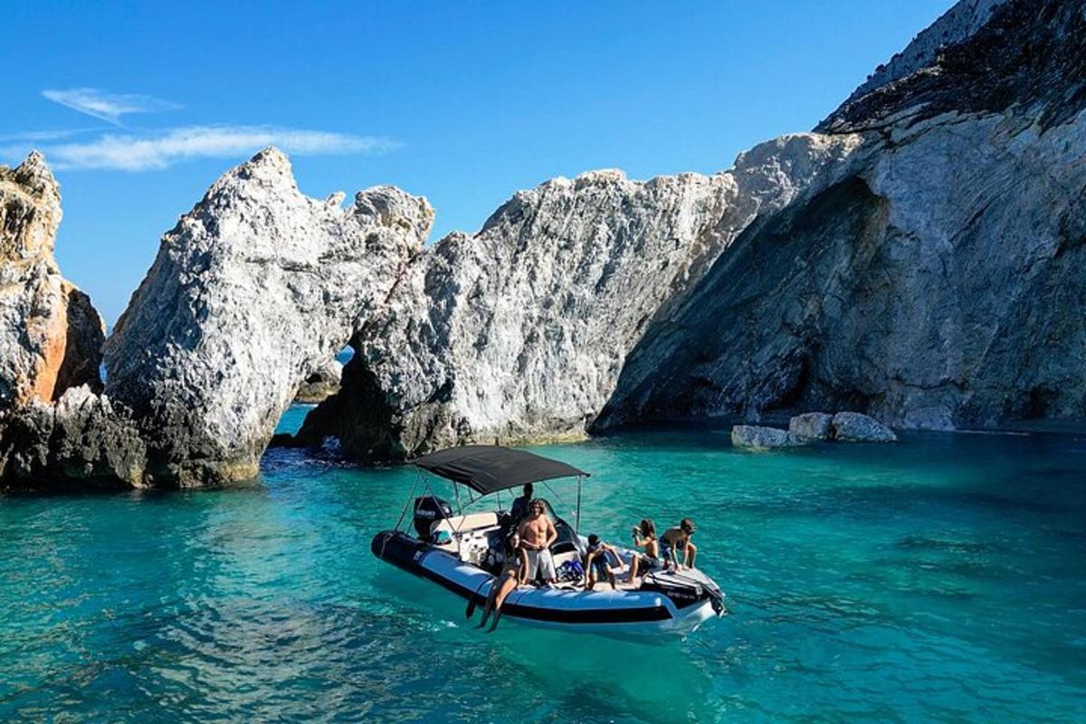 a group of people on a boat in the water