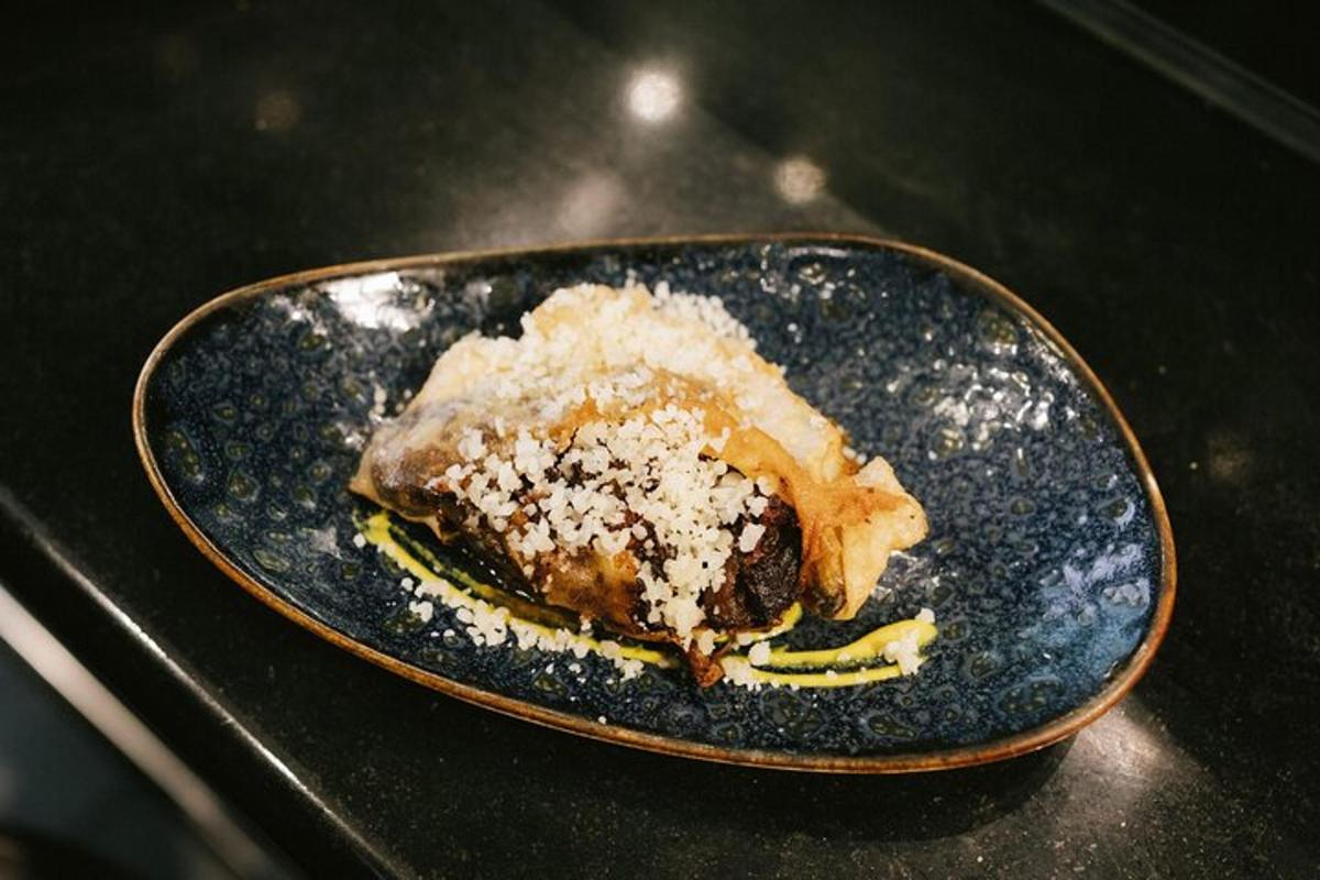 a piece of food on a plate on a table
