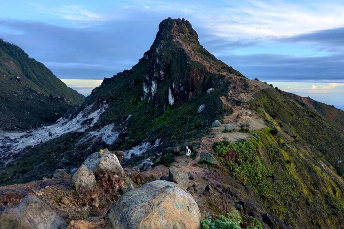 a person standing on top of a mountain