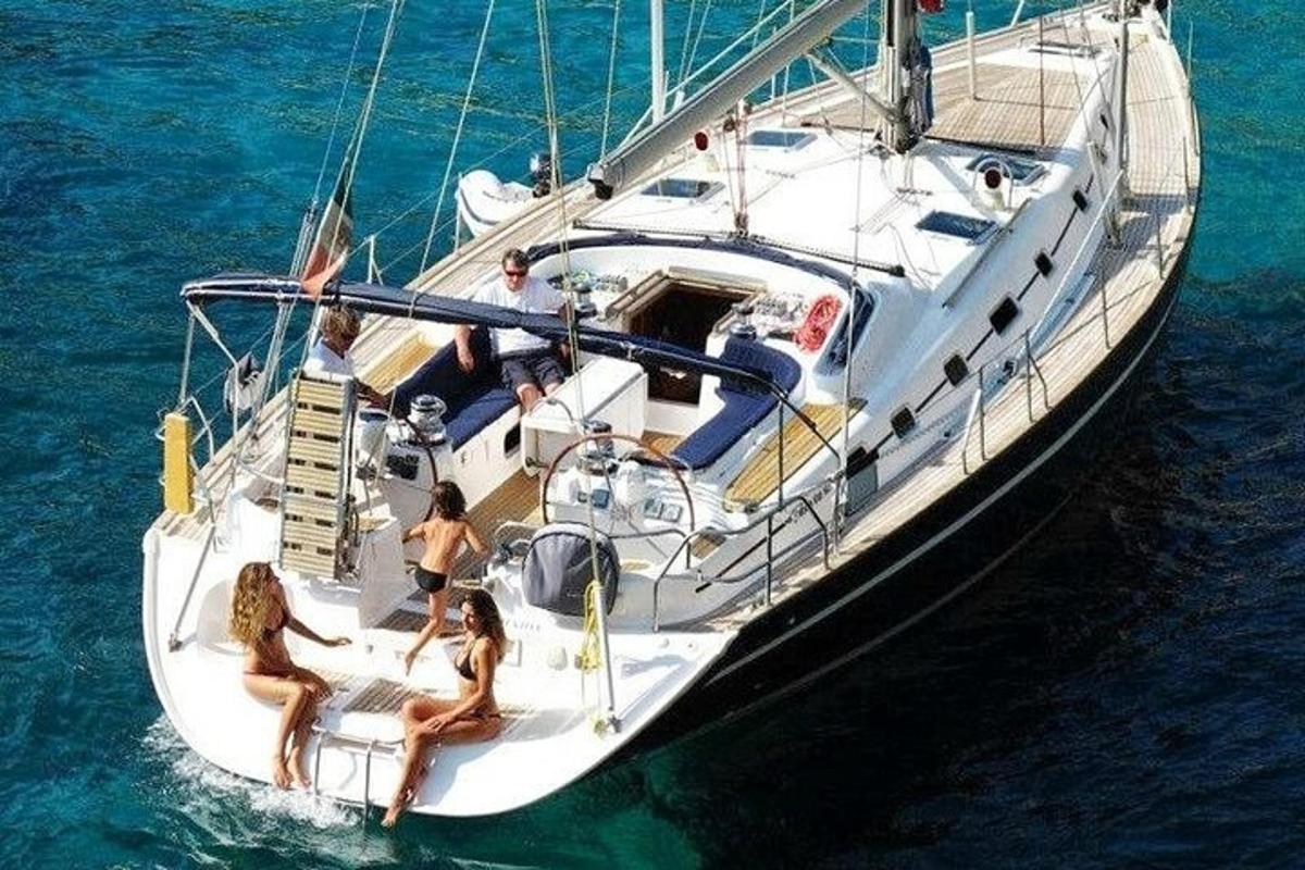a group of people on a boat in the water