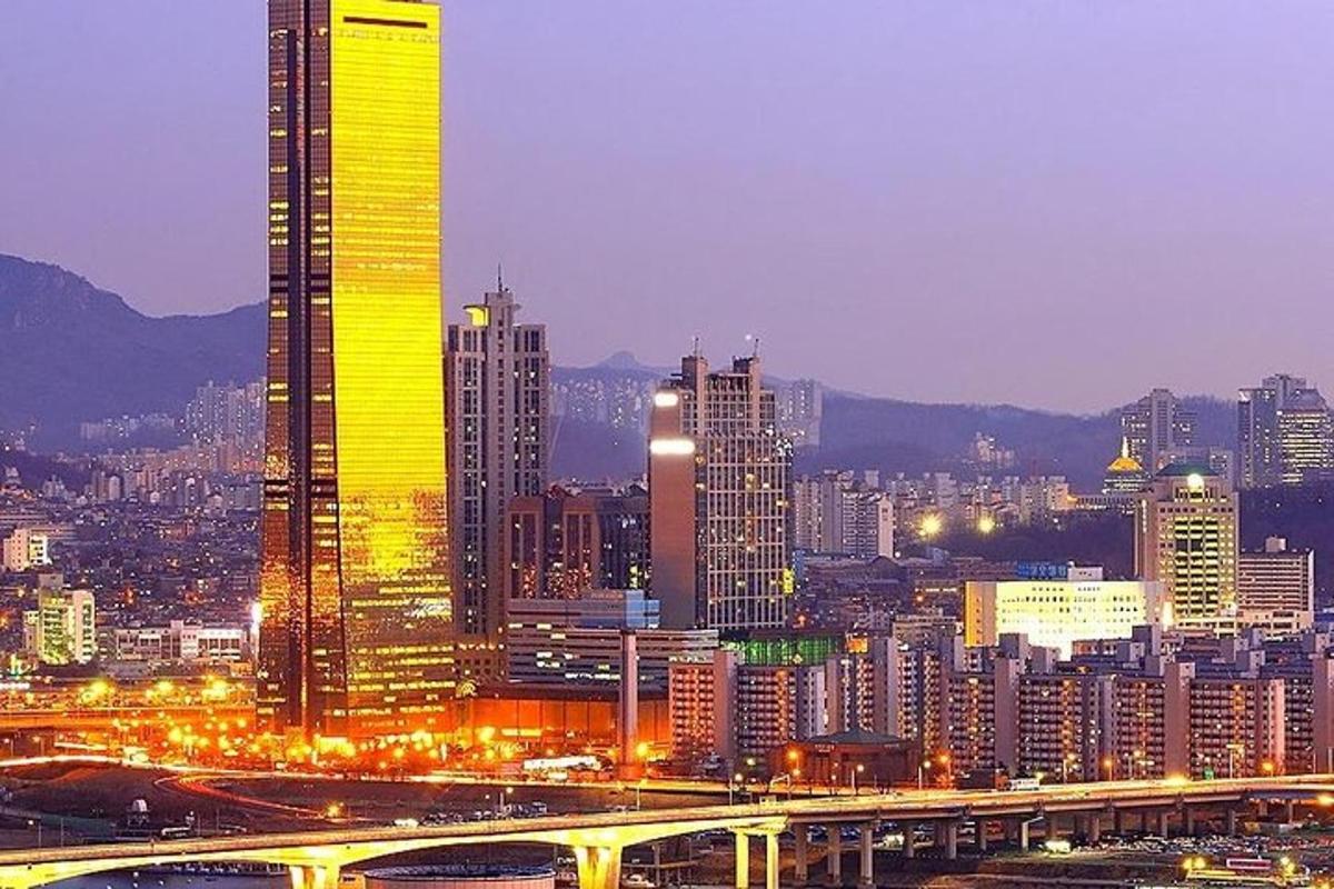 a view of a city at night with buildings
