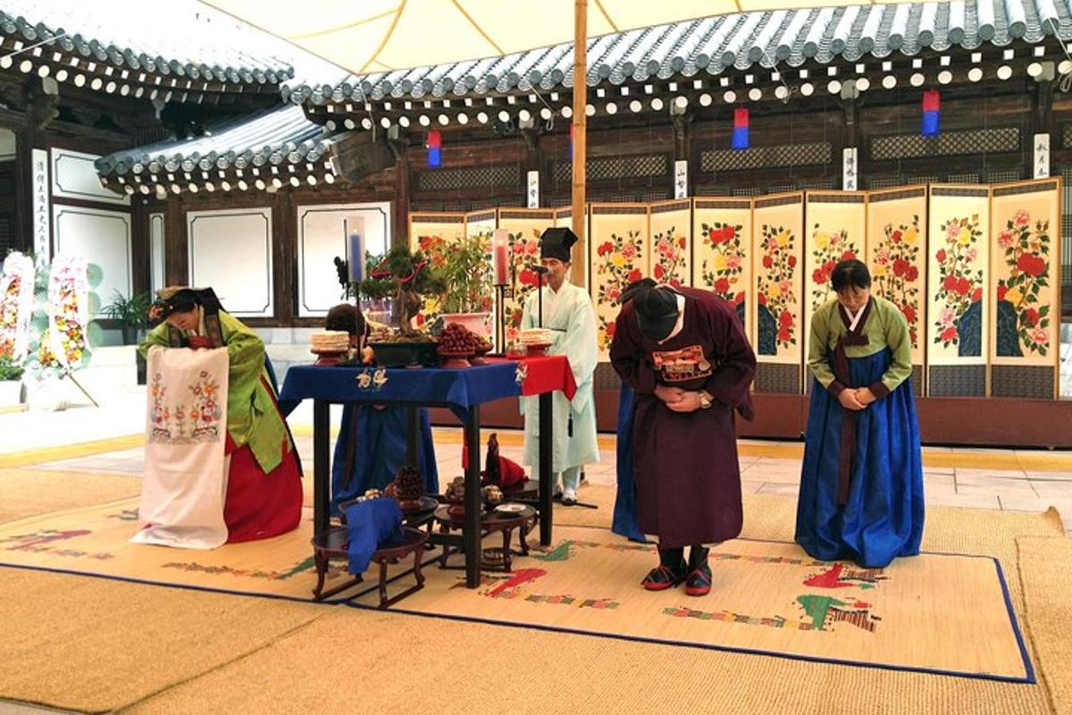 a group of people standing around a table in a building