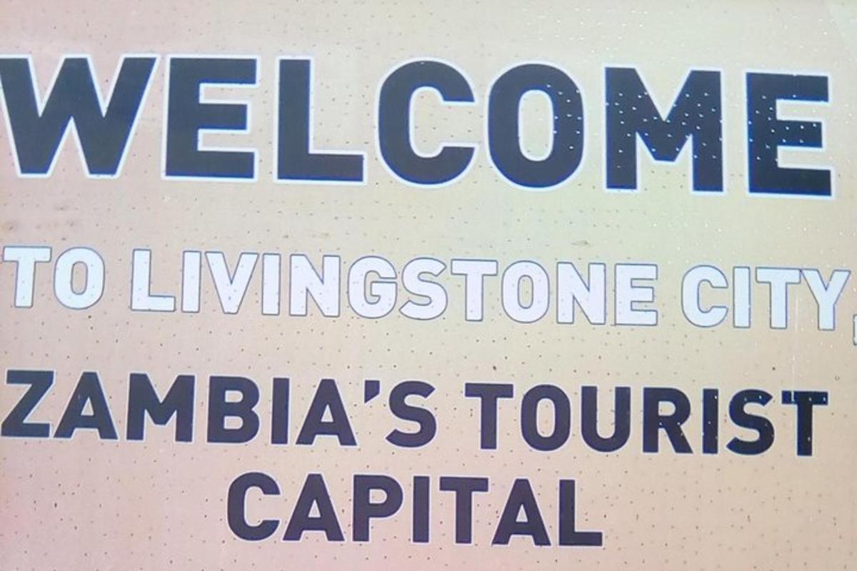 a sign that says welcome to lithosphere city zambica tourist capital