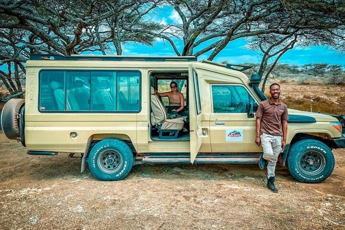 a man is standing in front of a van