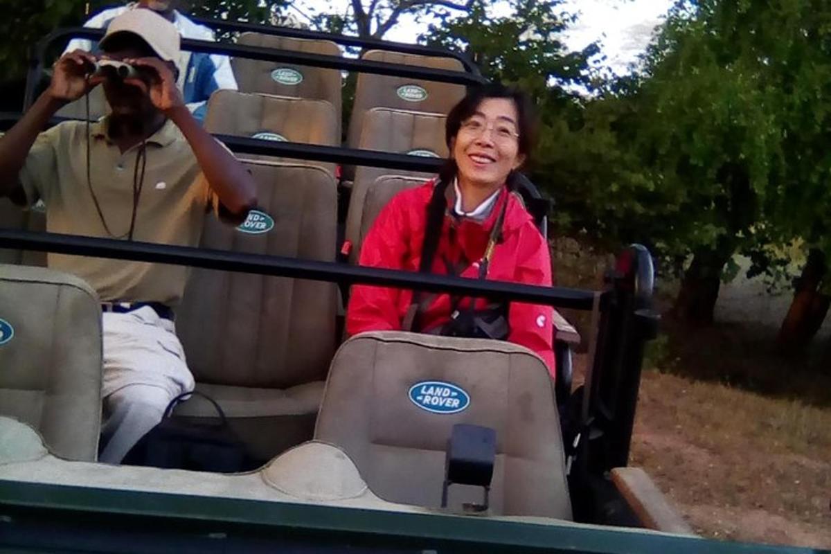 a woman sitting in the back of a roller coaster
