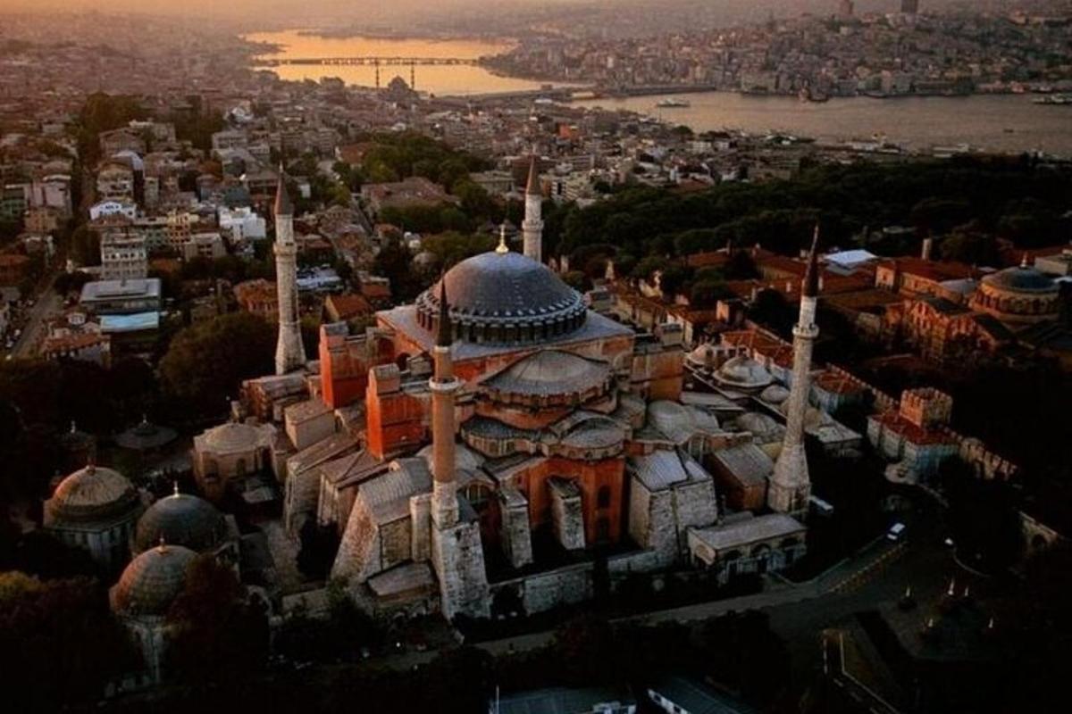an aerial view of a building with mosques