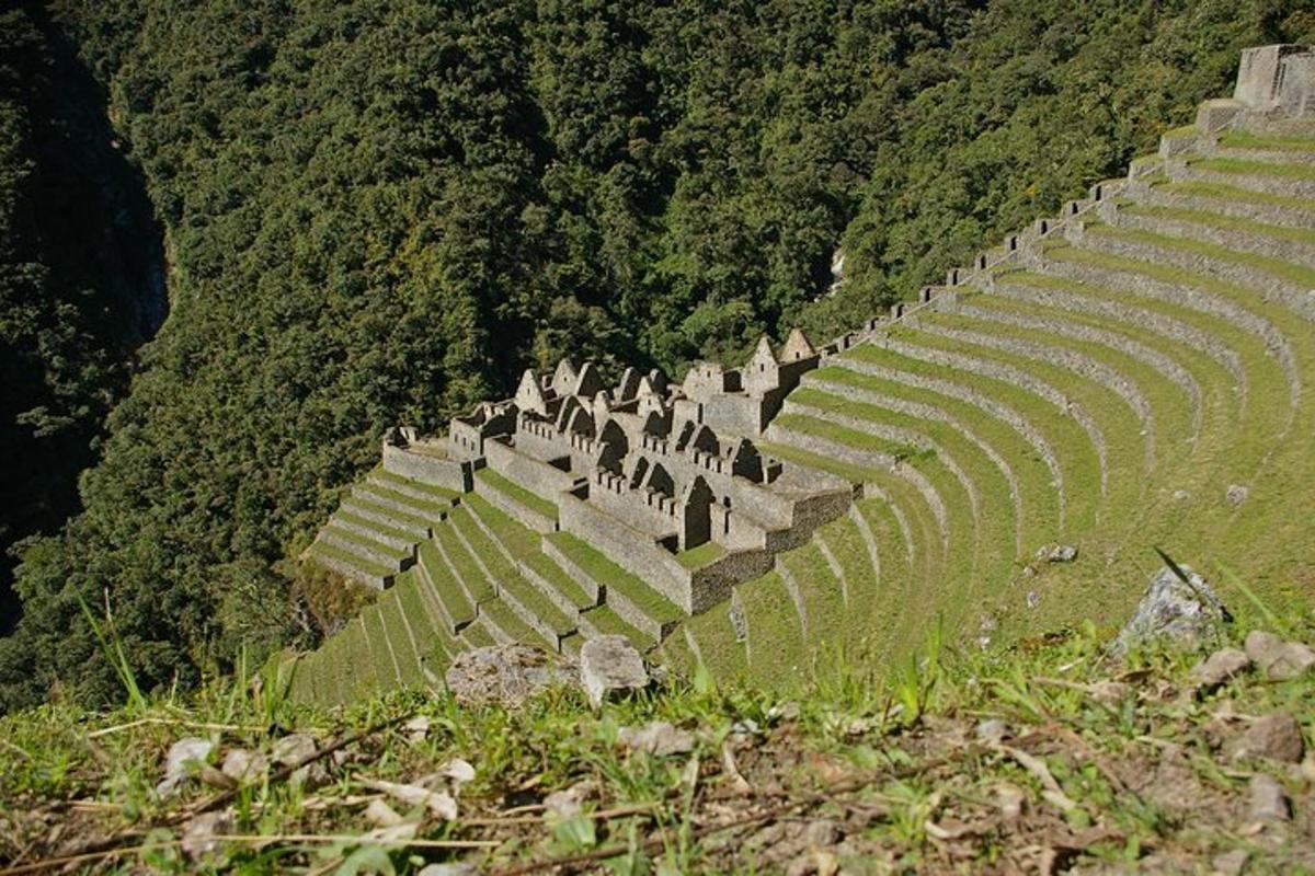 an ancient amphitheater on the side of a mountain
