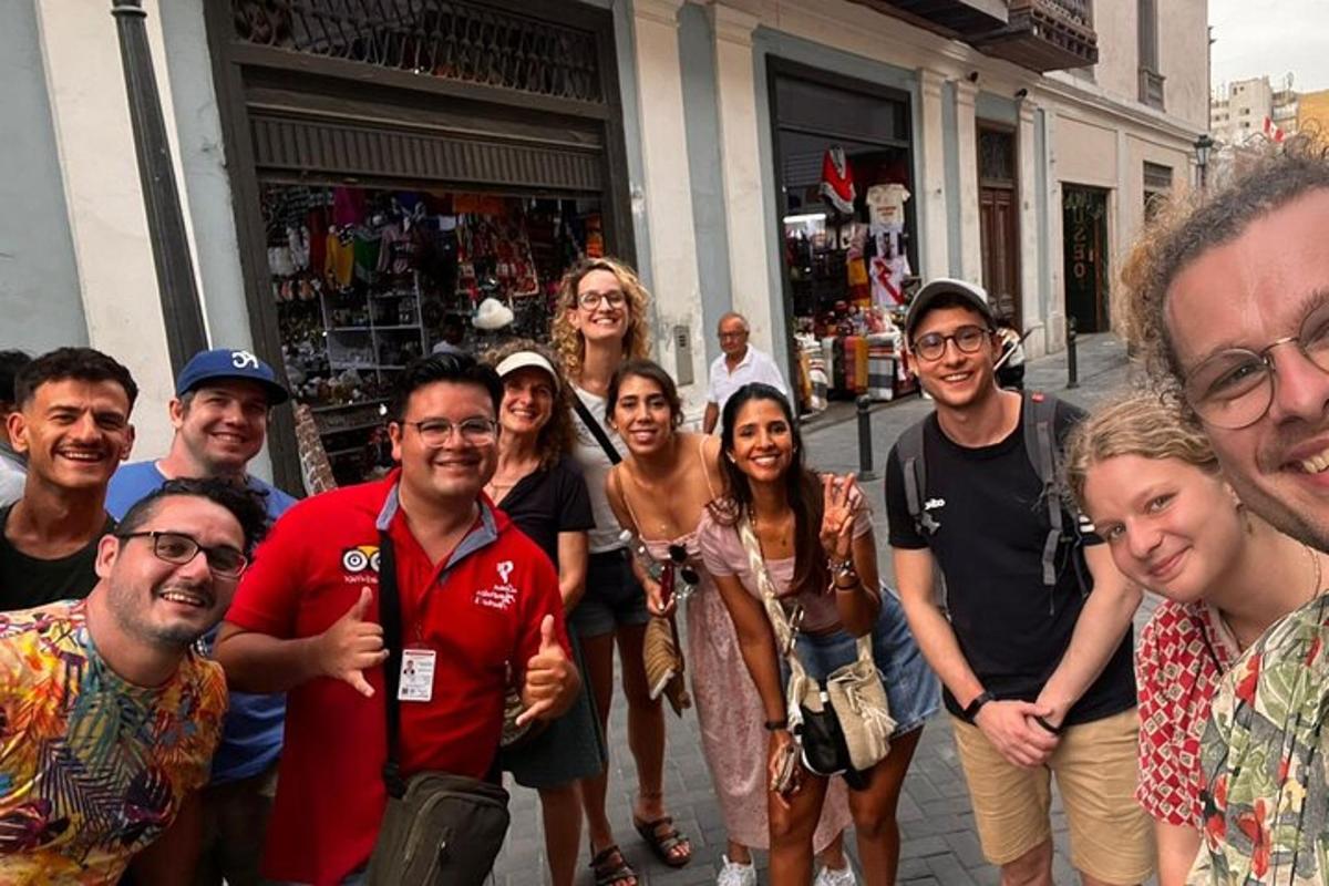 a group of people posing for a picture on a street