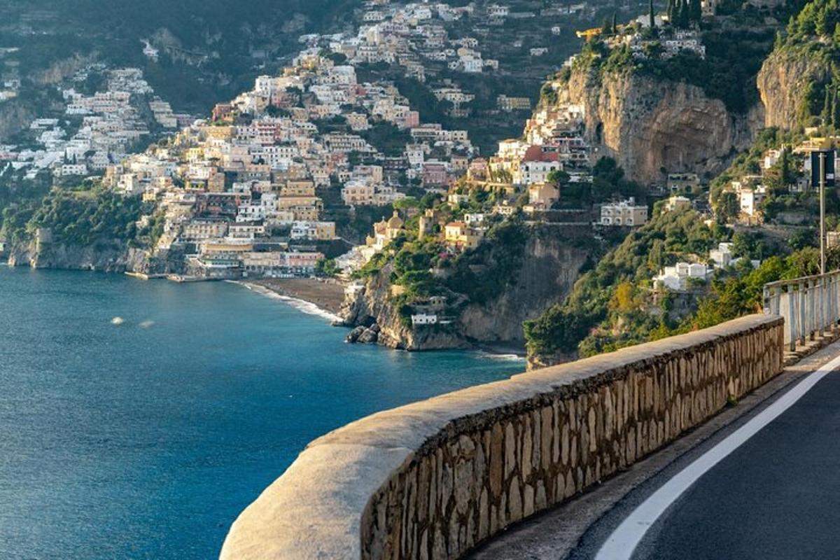 a view of a town on the side of a mountain