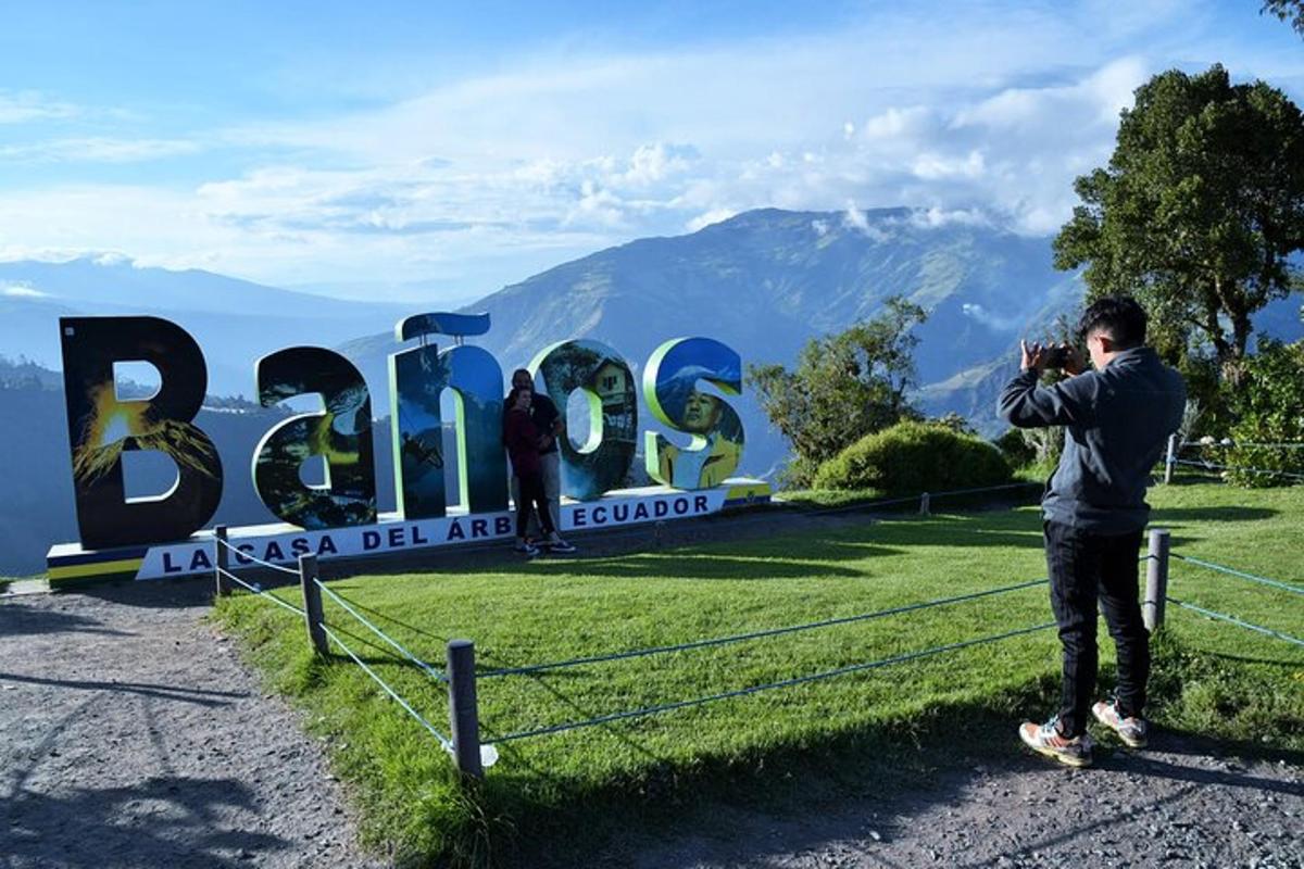 a man taking a picture of a sign with a camera