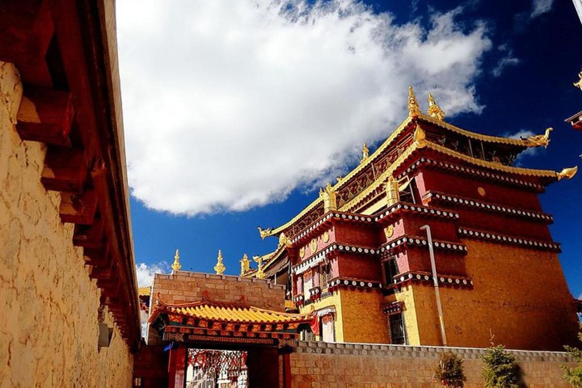 a large building with gold spikes on top of it