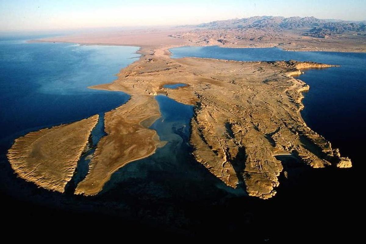 an aerial view of an island in the water
