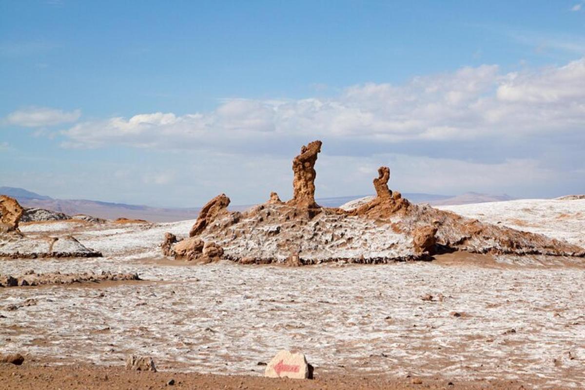 a rock formation in the middle of a desert
