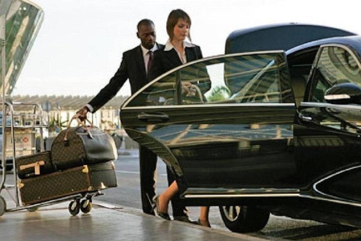 a man and a woman getting out of a car
