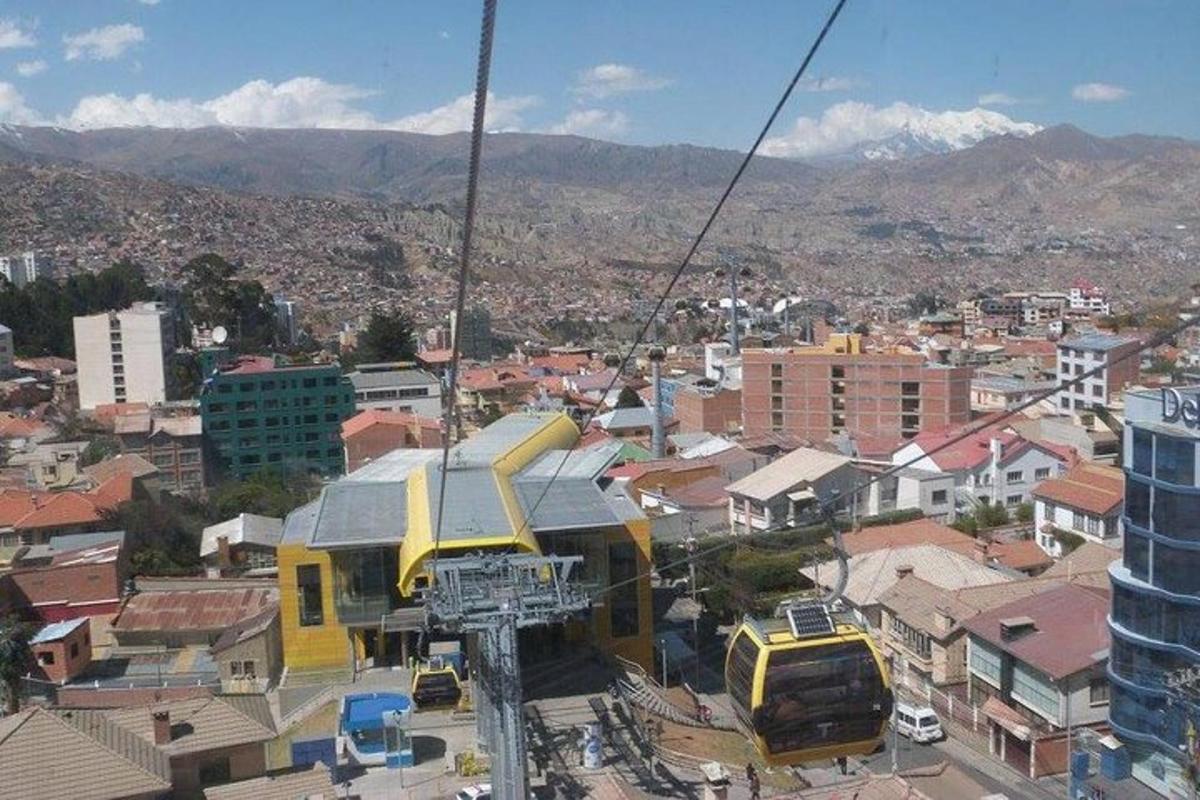 a gondola ride over a city with a city