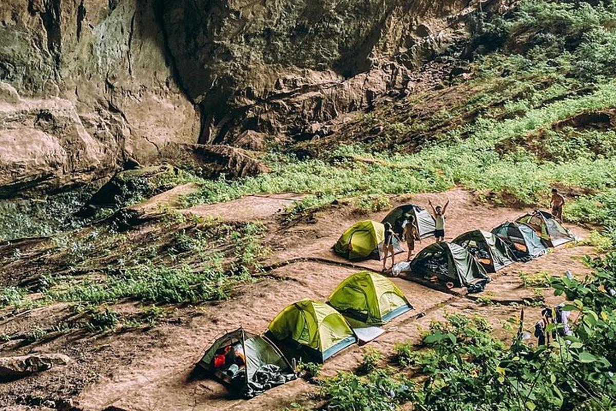a group of tents on the side of a mountain