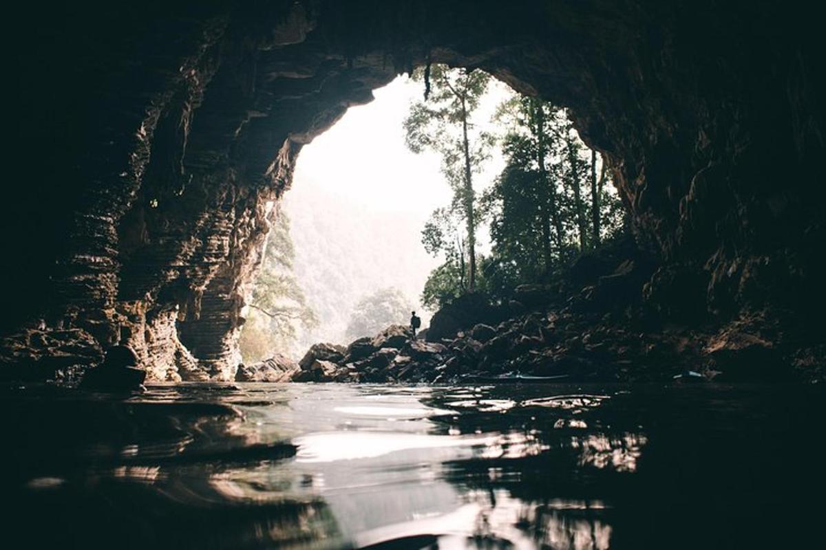 a cave with a river inside of it