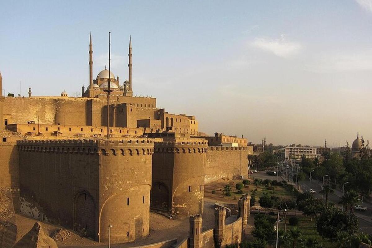 an old building with two mosques in a city