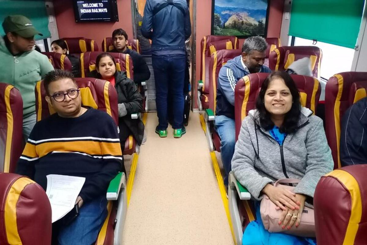 a group of people sitting on a bus
