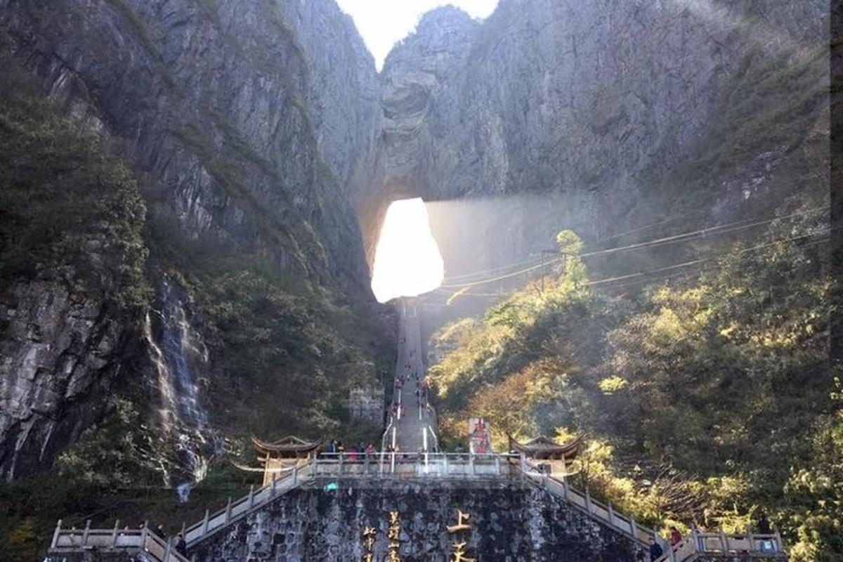 a view of a waterfall in a mountain