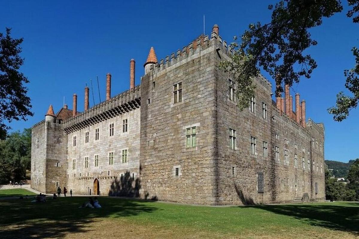 a large castle with a bunch of chimneys on it