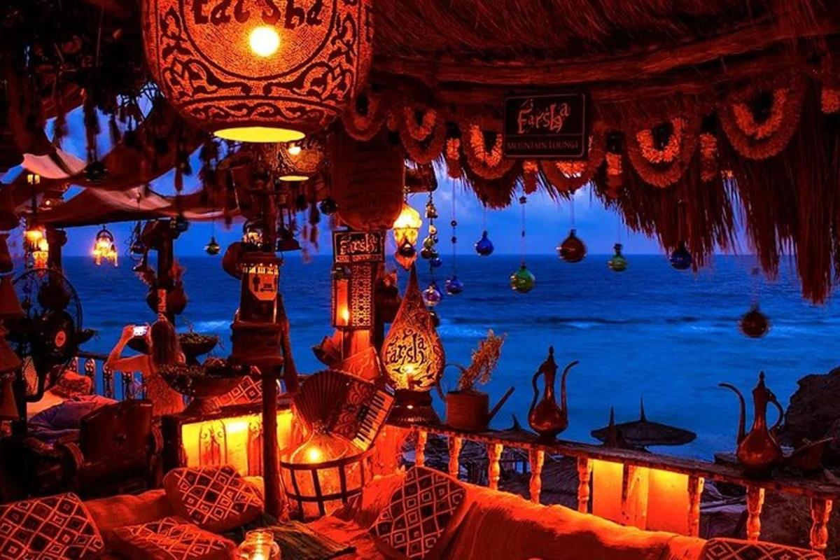 a room with a view of the ocean at night