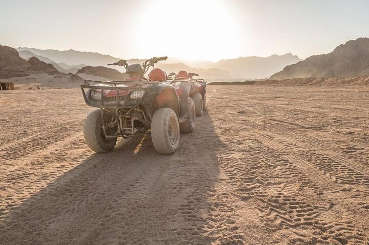 a four wheeler parked in the desert