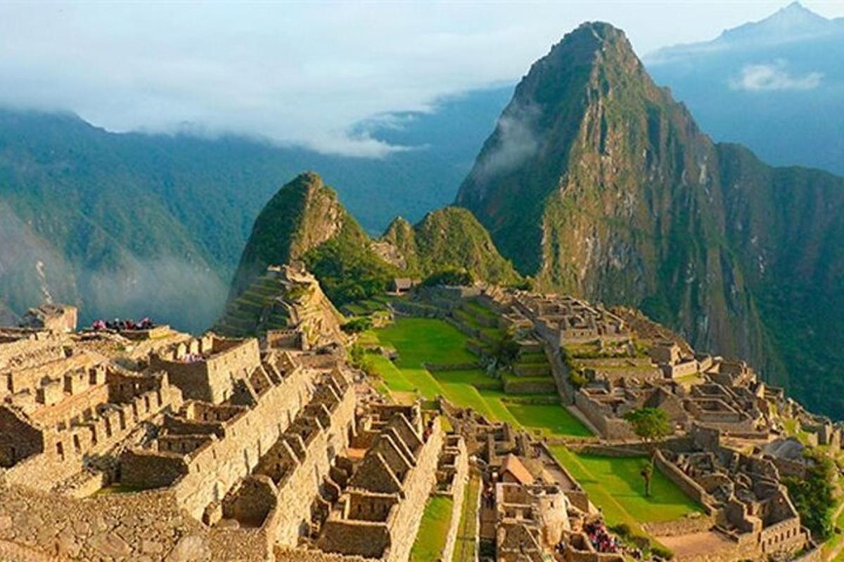 an aerial view of an ancient city on a mountain
