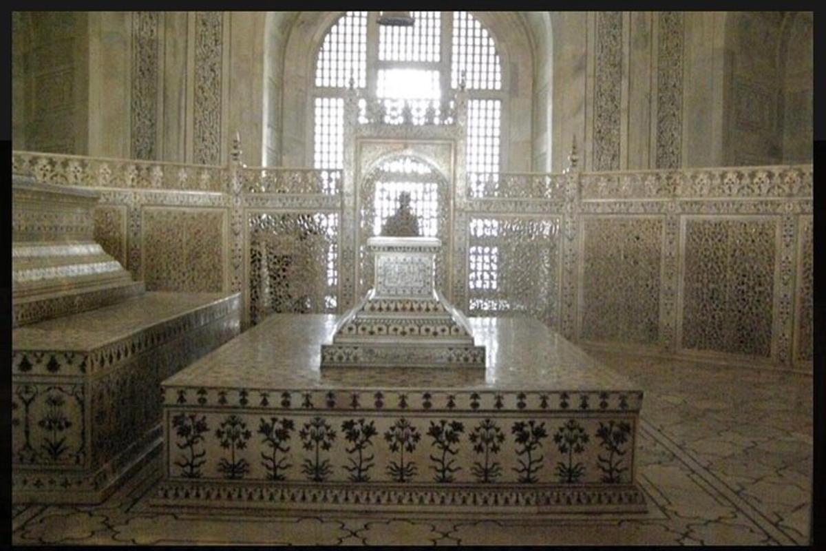 a large room with stairs and a large window